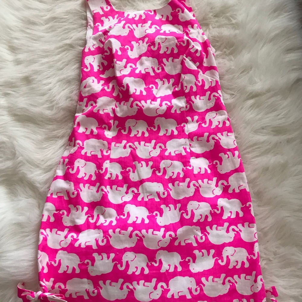 Pop Pink Tusk in The Sun Dress.
